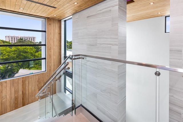 a bathroom with a stove and a shower