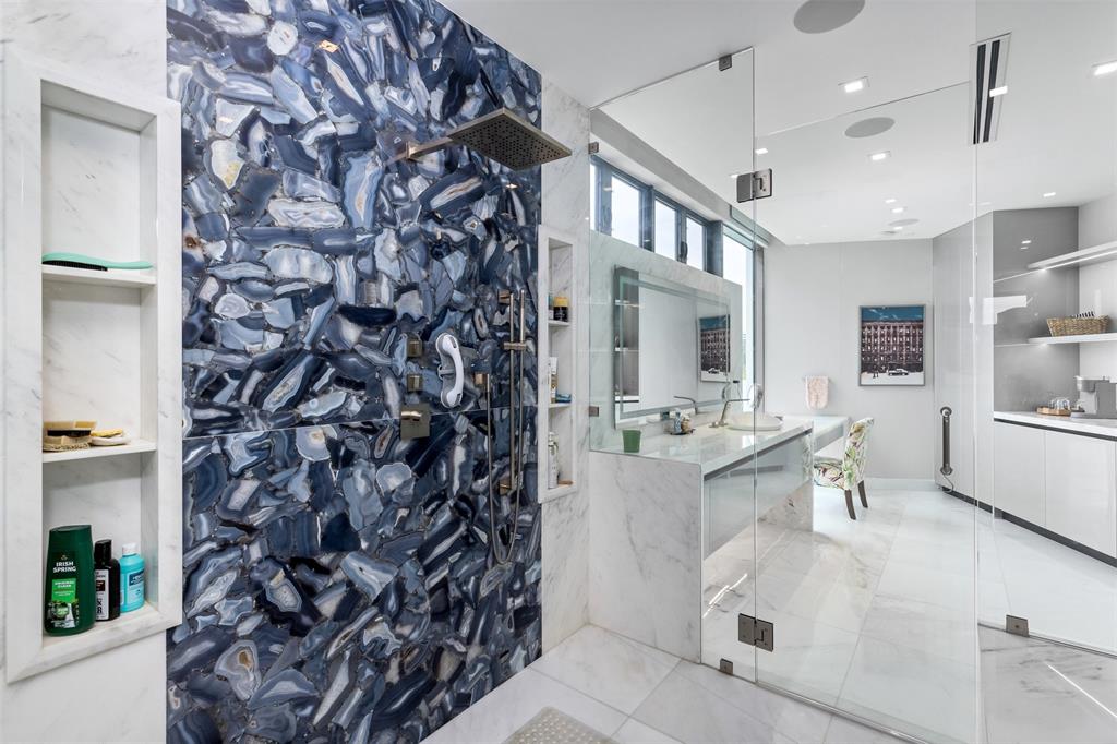 34 Minnetonka Road Sea Ranch Lakes, FL 33308 - Photo 47 of 89 a living room with a large tree and a chandelier