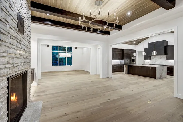 a view of a kitchen with a sink and a kitchen view