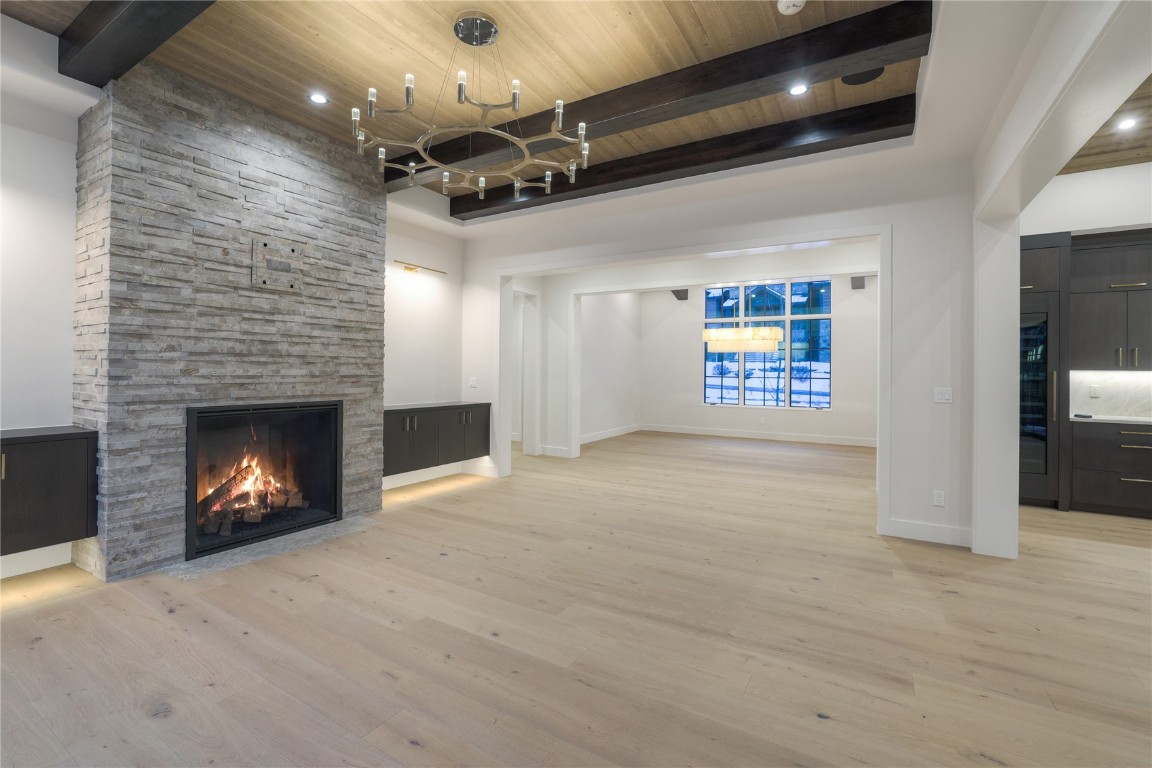 90 West Trade Court Keystone, CO 80435 - Photo 15 of 50 a view of an empty room with a fireplace and a fan