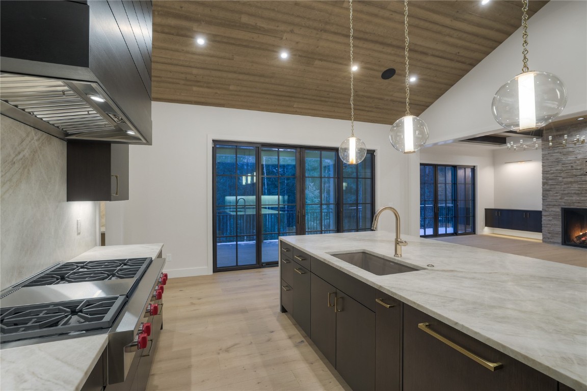 90 West Trade Court Keystone, CO 80435 - Photo 18 of 50 a kitchen with sink stove and refrigerator