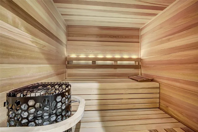 a bathroom with a sink vanity and toilet