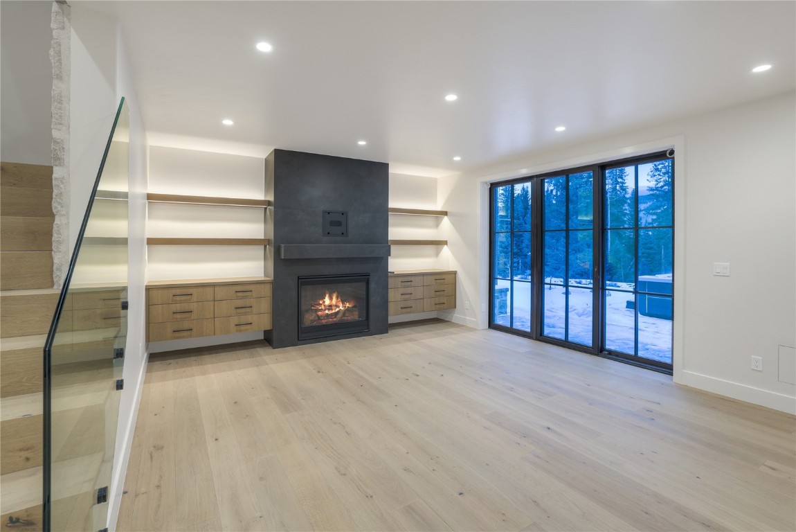 90 West Trade Court Keystone, CO 80435 - Photo 38 of 50 a view of an empty room with a fireplace and a window