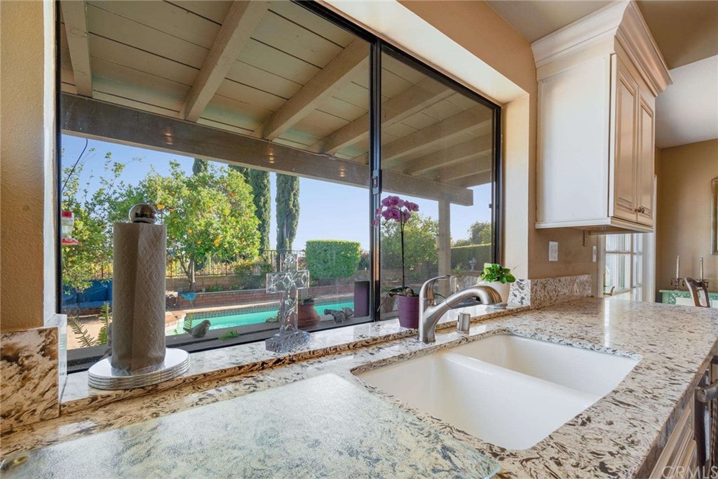 3750 Valley Lights Drive Pasadena, CA 91107 - Photo 21 of 55 a kitchen view living room with furniture and floor to ceiling windows