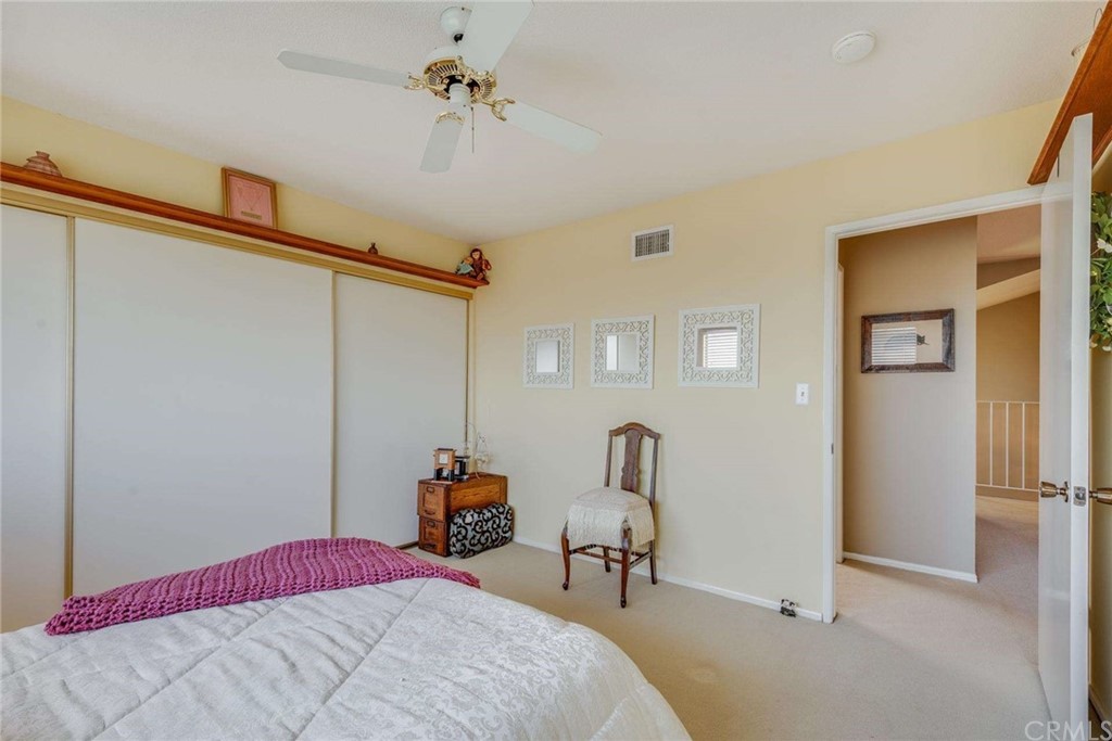 3750 Valley Lights Drive Pasadena, CA 91107 - Photo 33 of 55 a bedroom with a bed and a table in it