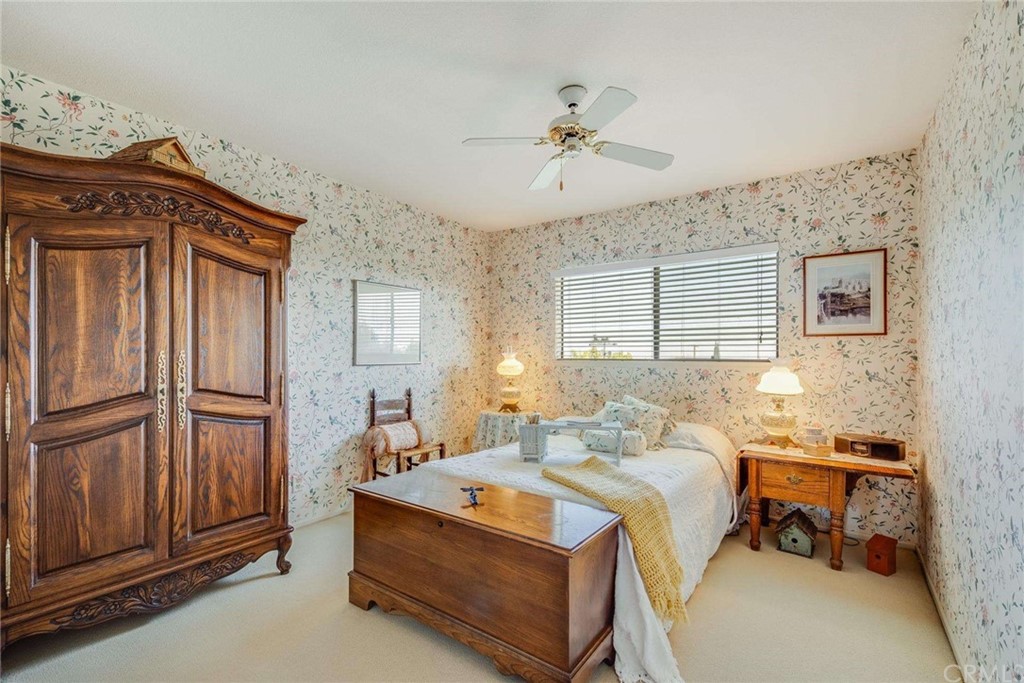 3750 Valley Lights Drive Pasadena, CA 91107 - Photo 34 of 55 a bedroom with a bed and a chandelier