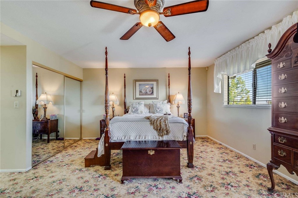 3750 Valley Lights Drive Pasadena, CA 91107 - Photo 38 of 55 a bed room with a bed and a chandelier