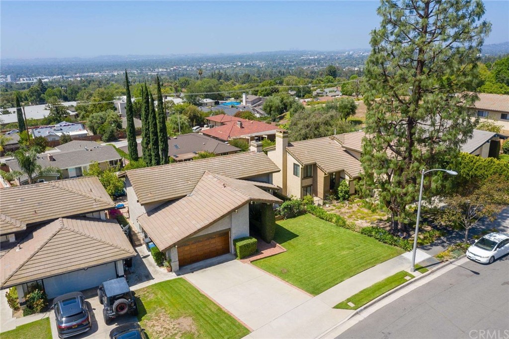 3750 Valley Lights Drive Pasadena, CA 91107 - Photo 52 of 55 an aerial view of a house with a garden and trees