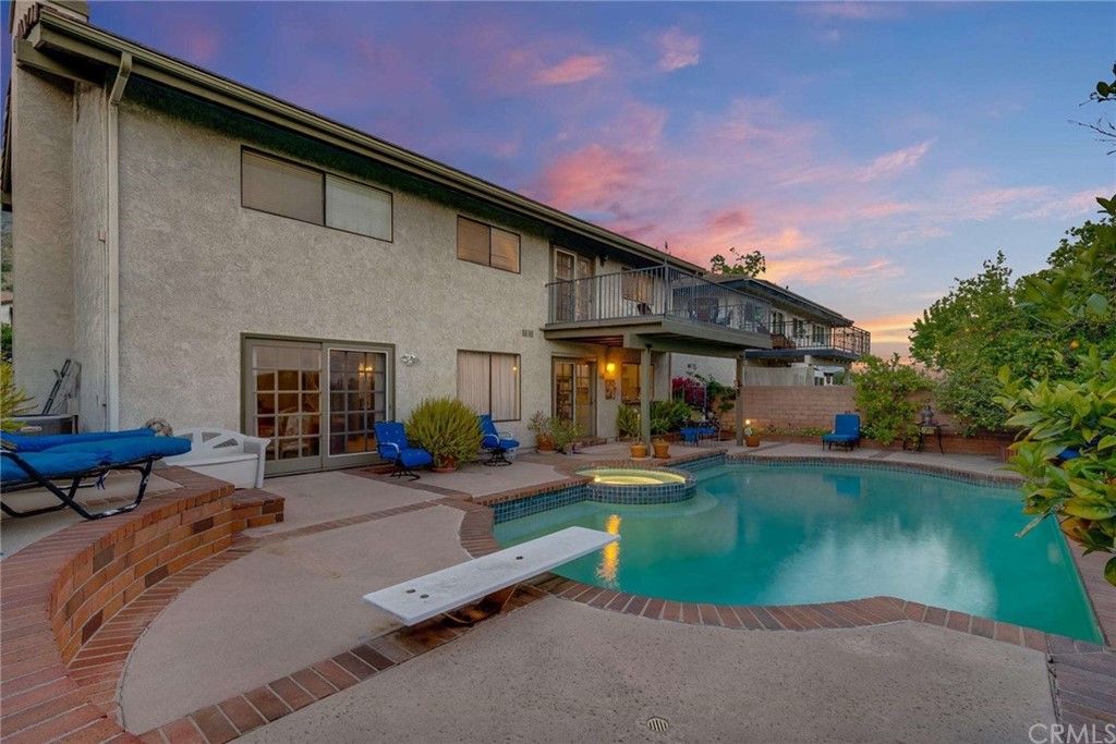 3750 Valley Lights Drive Pasadena, CA 91107 - Photo 6 of 55 a view of a house with backyard patio and swimming pool