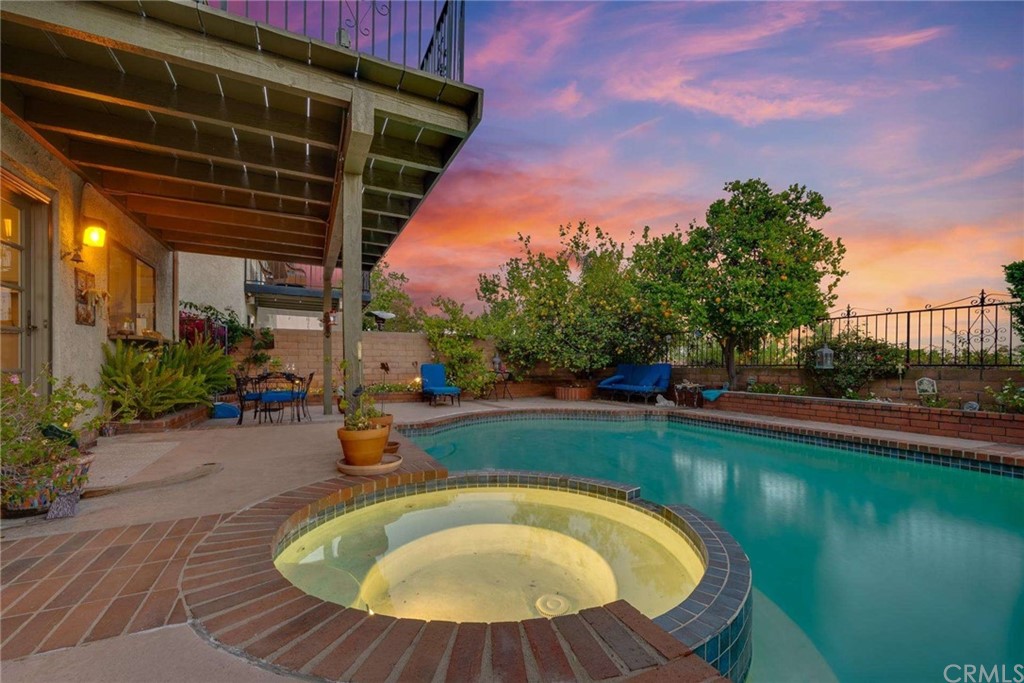 3750 Valley Lights Drive Pasadena, CA 91107 - Photo 7 of 55 a view of a swimming pool with a patio