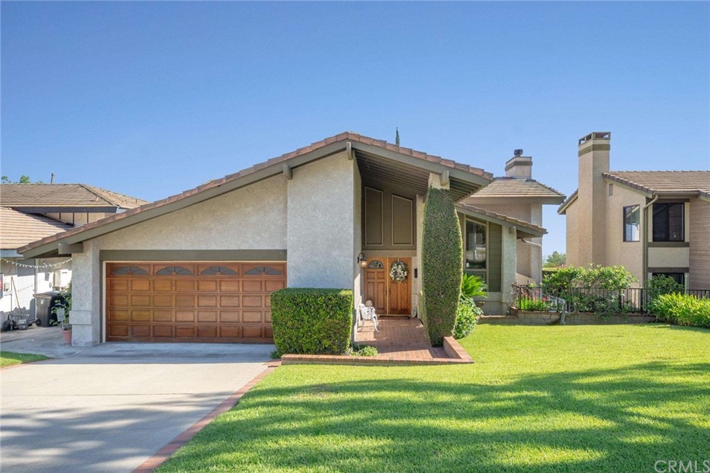 3750 Valley Lights Drive Pasadena, CA 91107 - Photo 8 of 55 a front view of a house with a yard