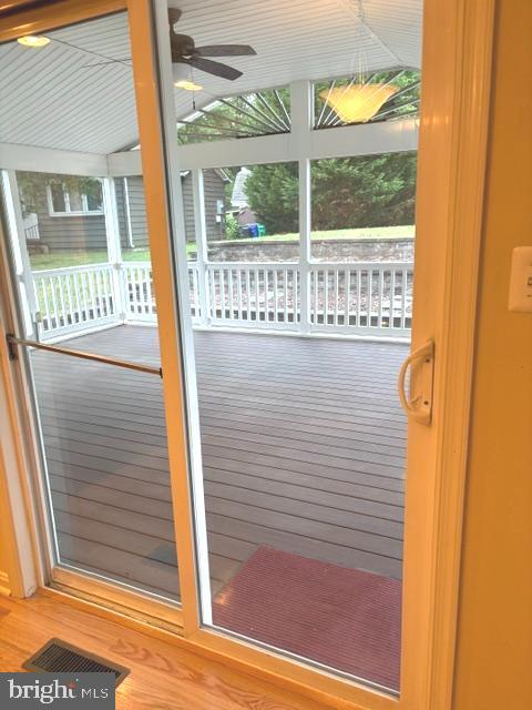 5870 Deer Ridge Lane Elkridge, MD 21075 - Photo 19 of 55 Slider from kitchen to screened porch
