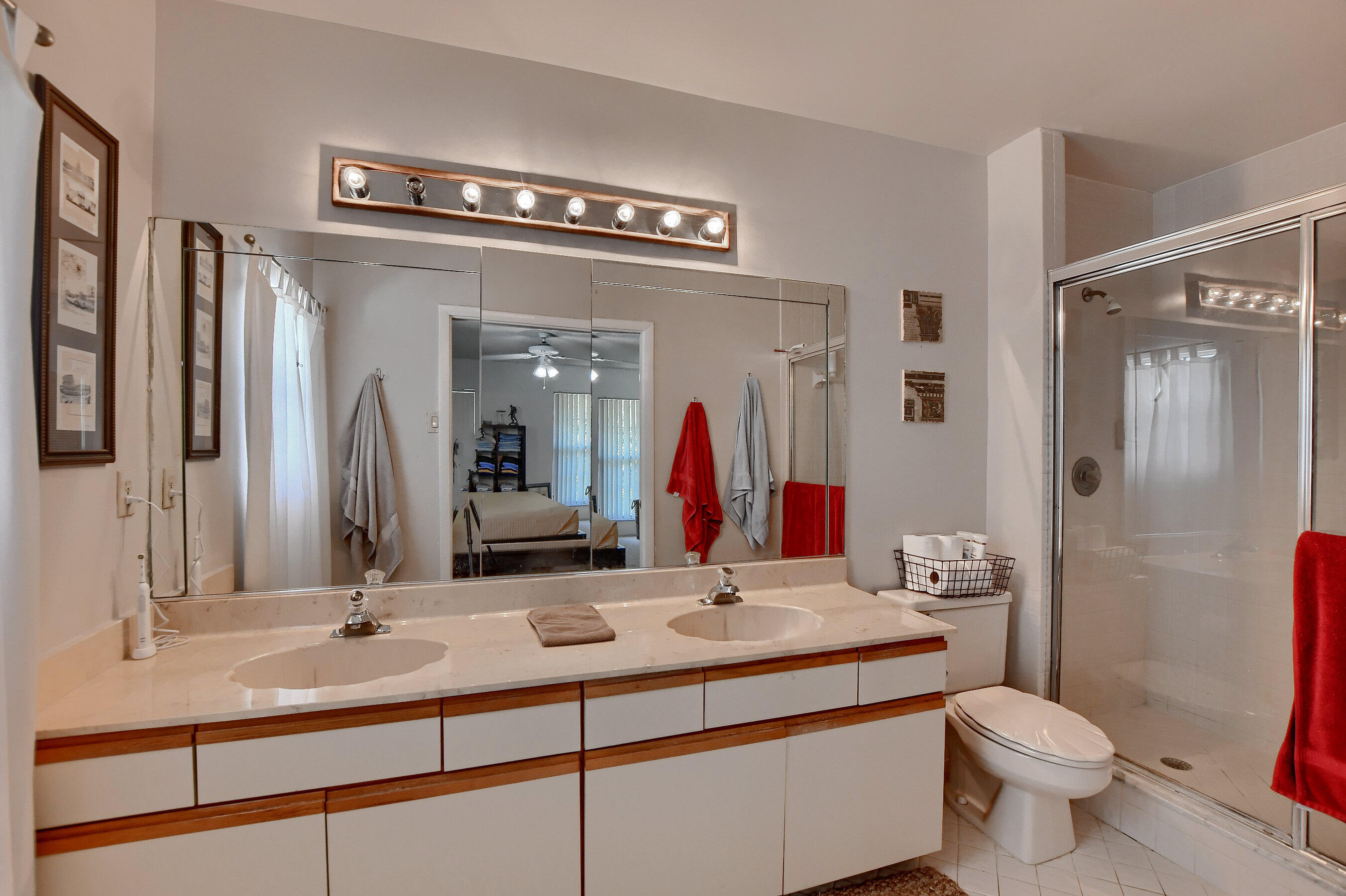 6237 Old Court Road, Unit 203 Boca Raton, FL 33433 - Photo 16 of 34 a bathroom with a sink and a mirror