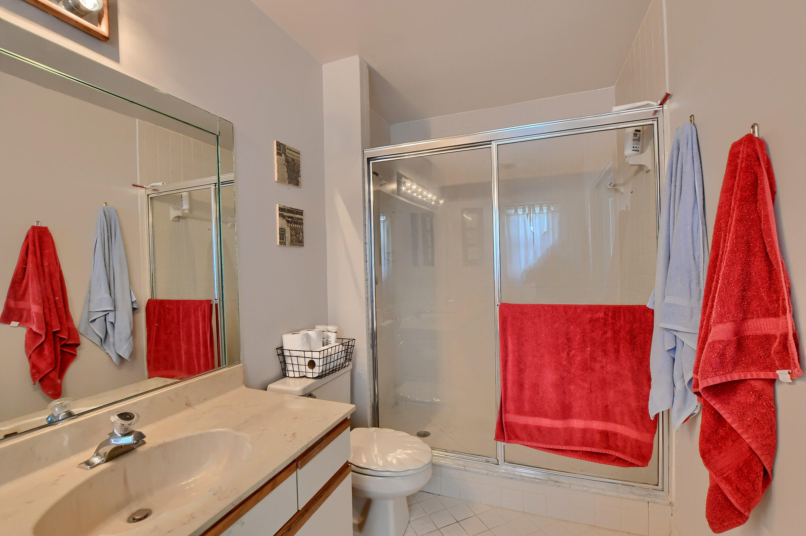 6237 Old Court Road, Unit 203 Boca Raton, FL 33433 - Photo 17 of 34 a bathroom with a sink toilet and shower
