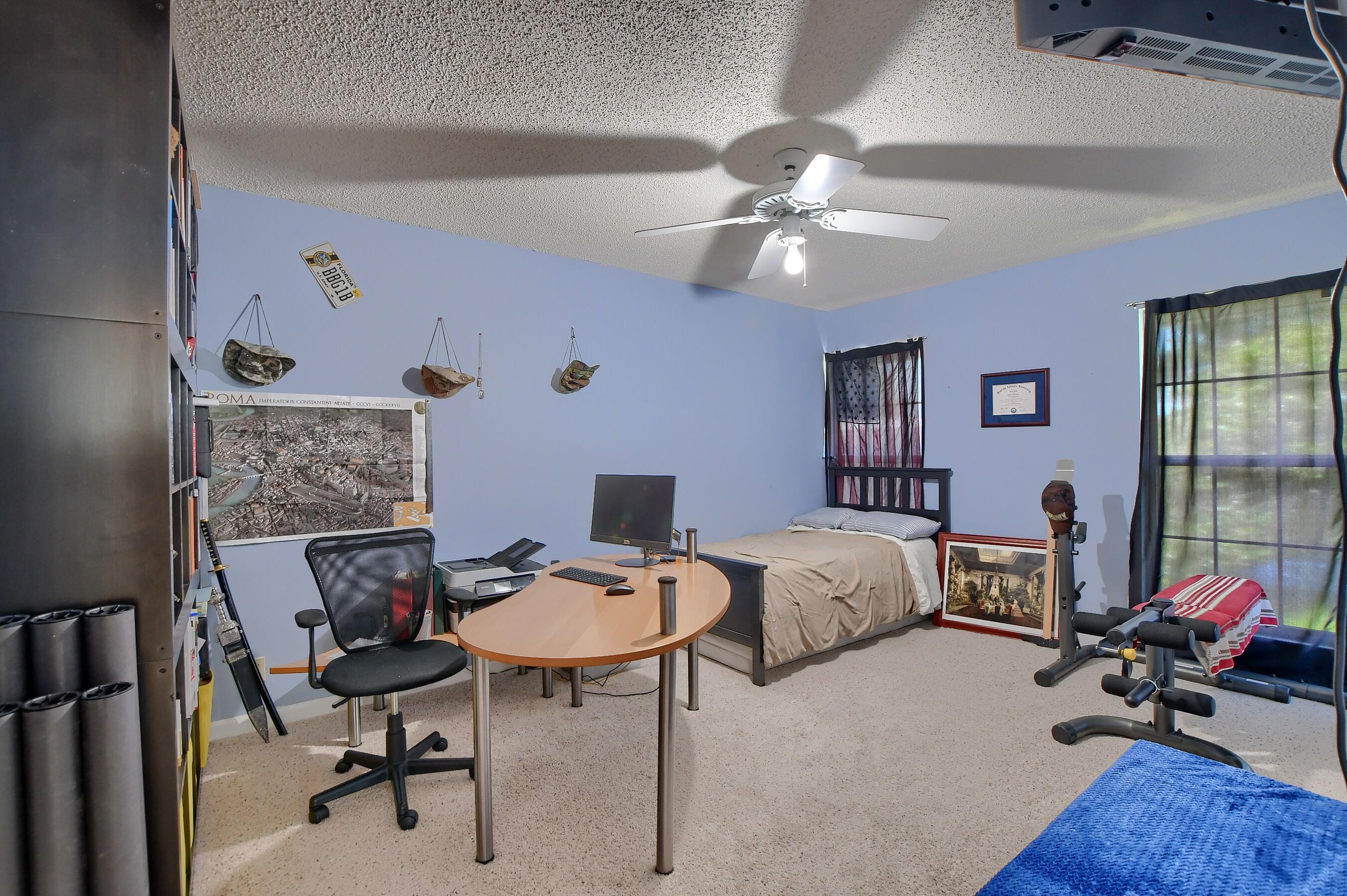 6237 Old Court Road, Unit 203 Boca Raton, FL 33433 - Photo 18 of 34 a view of a livingroom with furniture and a ceiling fan