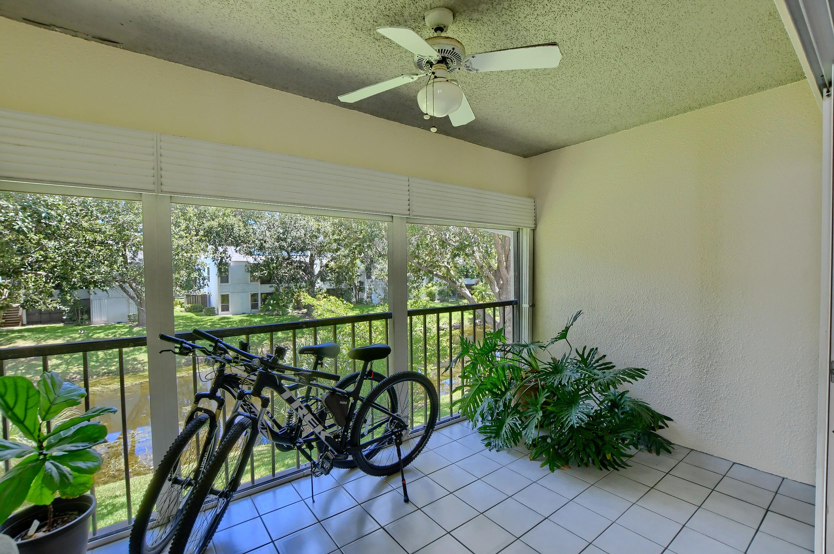 6237 Old Court Road, Unit 203 Boca Raton, FL 33433 - Photo 22 of 34 a view of a chairs and table in a balcony