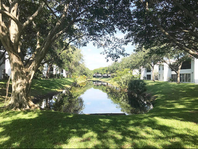 6237 Old Court Road, Unit 203 Boca Raton, FL 33433 - Photo 24 of 34 a view of a house with a yard