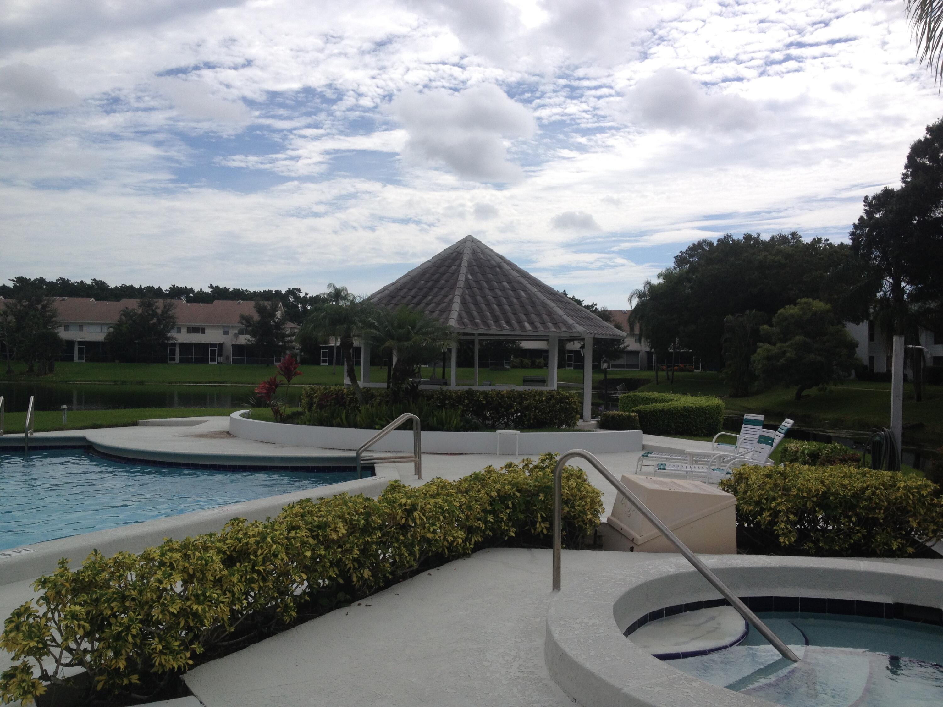 6237 Old Court Road, Unit 203 Boca Raton, FL 33433 - Photo 28 of 34 a front view of a house with garden