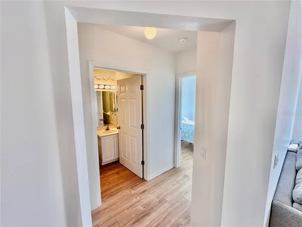 a bedroom with bed and window