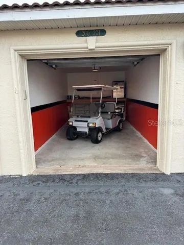 a sign that is on a brick wall