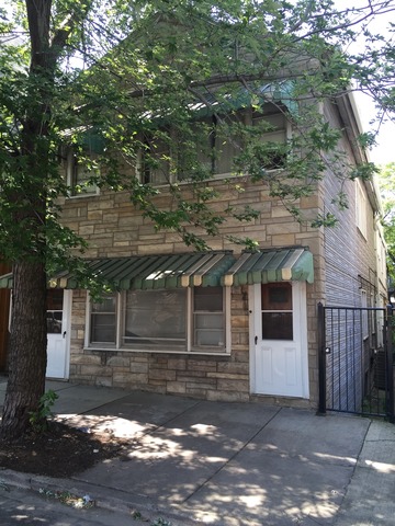 1232 North Noble Street Chicago, IL 60642 - Photo 2 of 7 a view of a large house with a tree