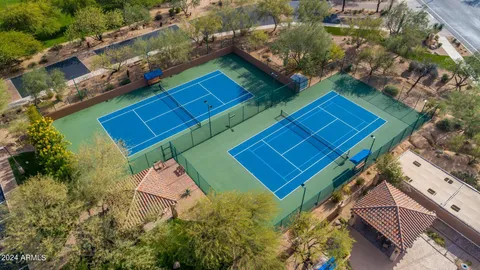 an aerial view of residential houses and outdoor space