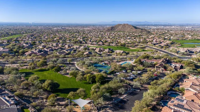 an aerial view of residential house with an outdoor space