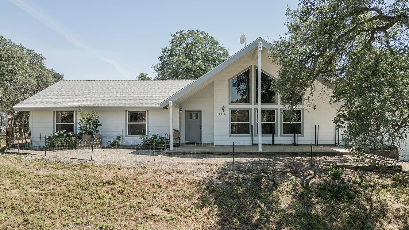 14815 Garlock Lane Prather, CA 93651 - Photo 79 of 80 a front view of a house with a yard