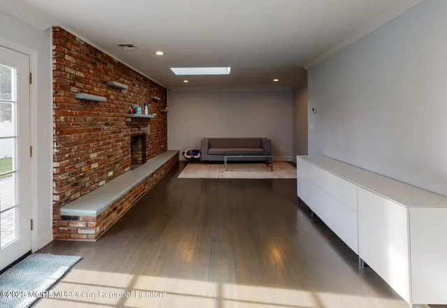 a view of lobby with furniture and stairs