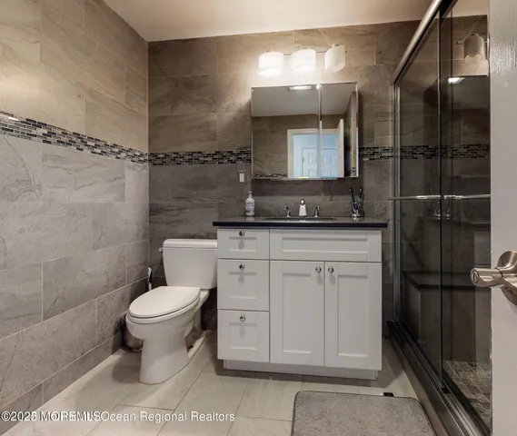 a room with furniture and white walls