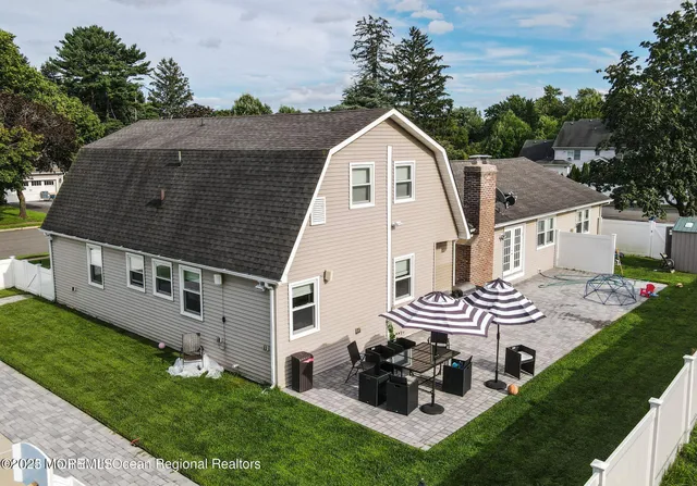 a view of a swimming pool with chairs