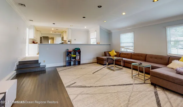 a living room with furniture and a couch