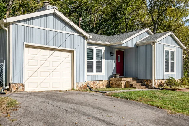 a house view with a garden space