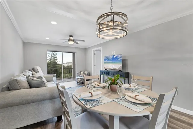 a view of a dining room with furniture window and outside view