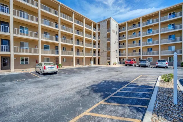 a cars parked in front of a building