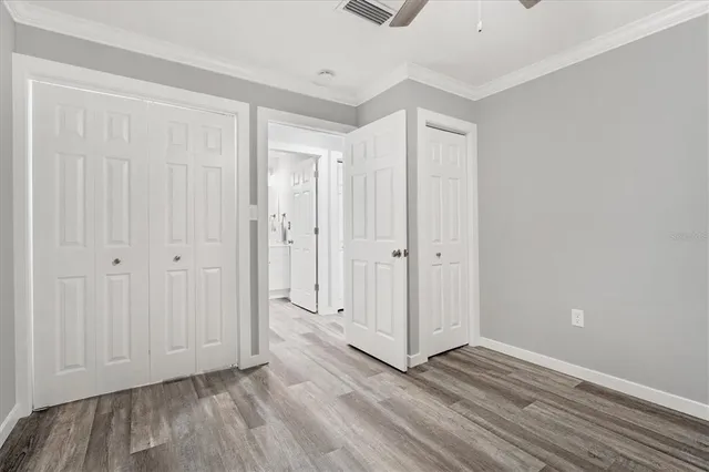 a view of a livingroom with wooden floor