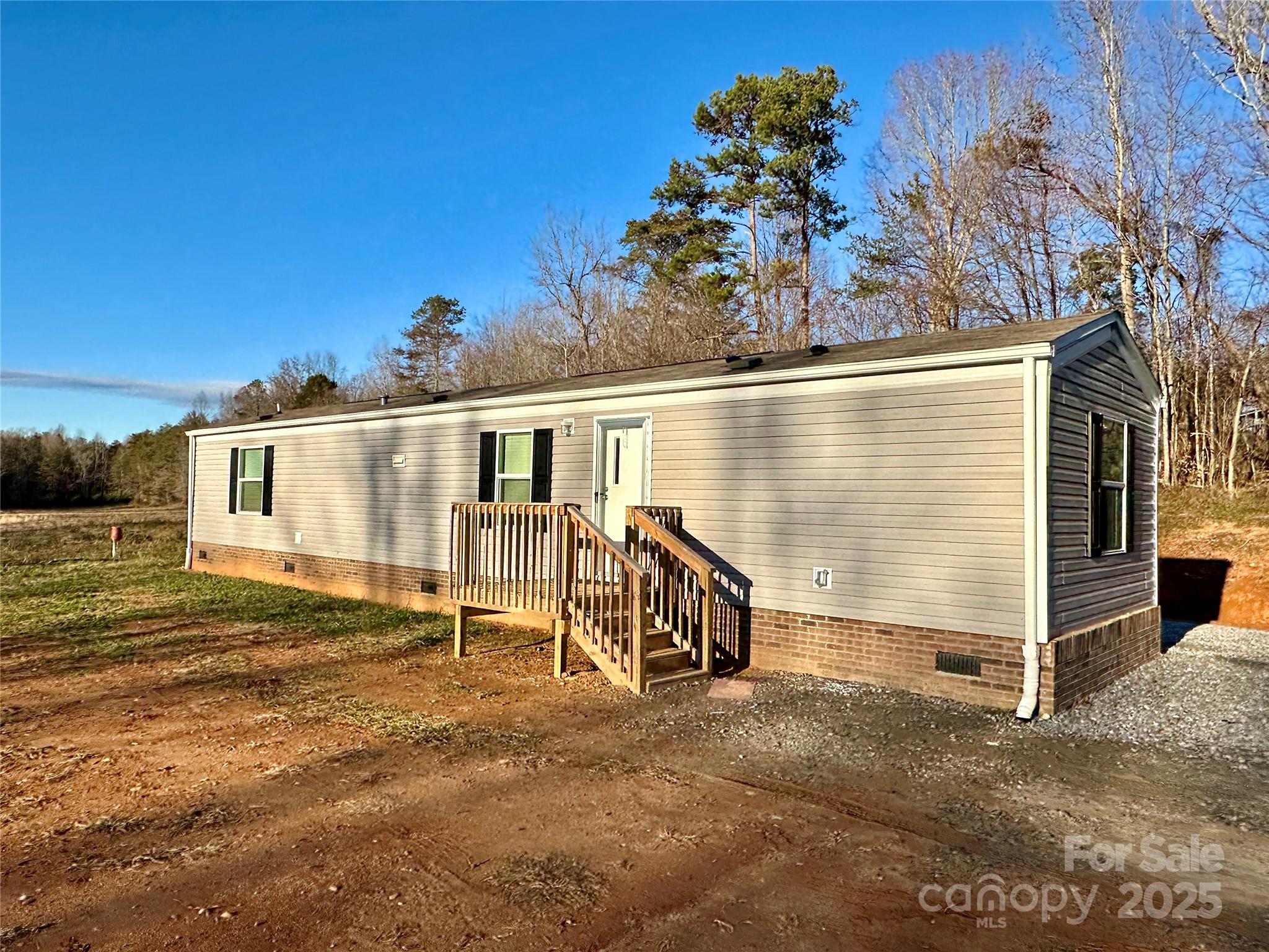 6264 Jenkins Road Morganton, NC 28655 - Photo 1 of 32 a view of a house with a yard