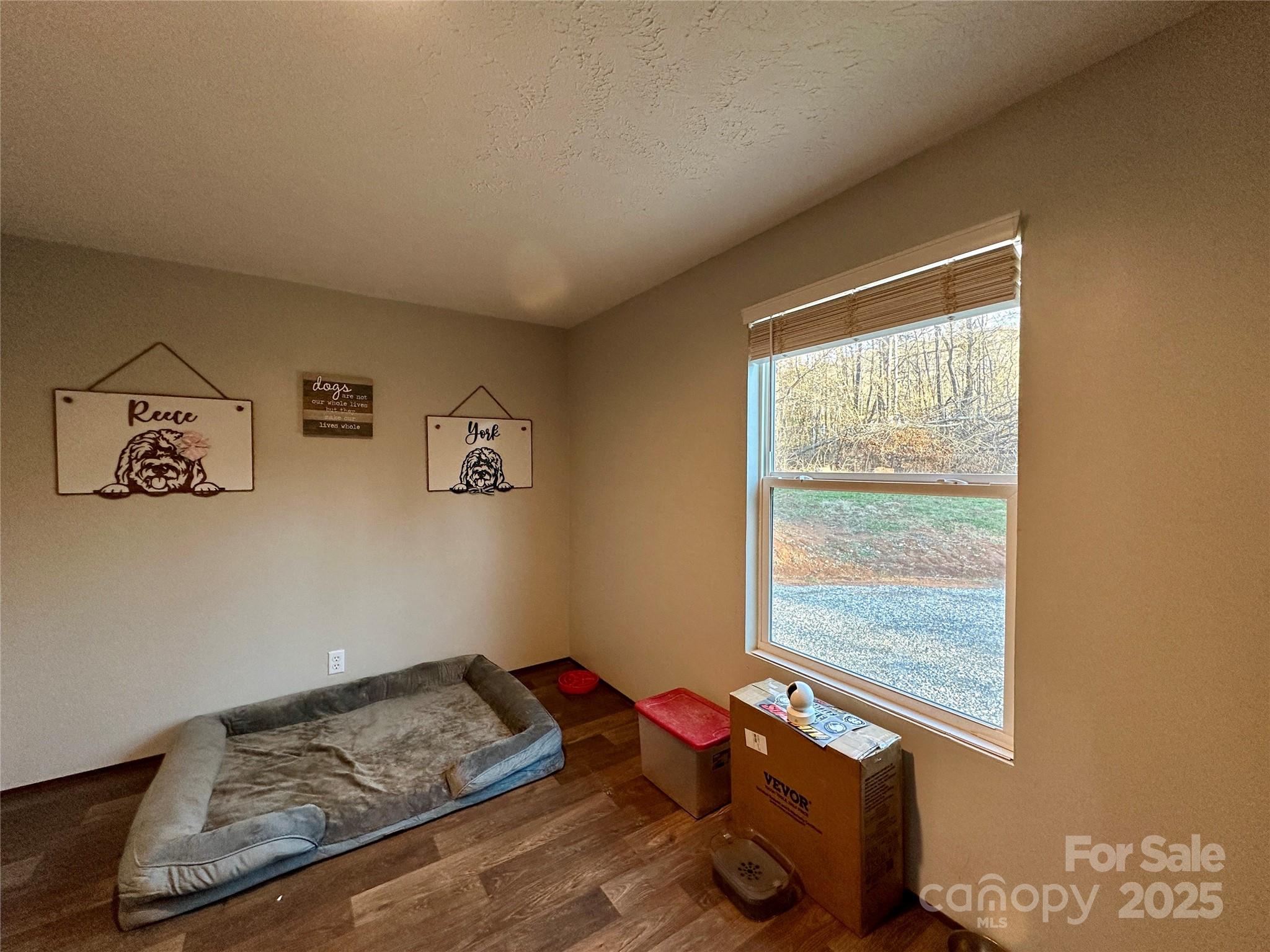 6264 Jenkins Road Morganton, NC 28655 - Photo 11 of 32 a bedroom with a bed and a window