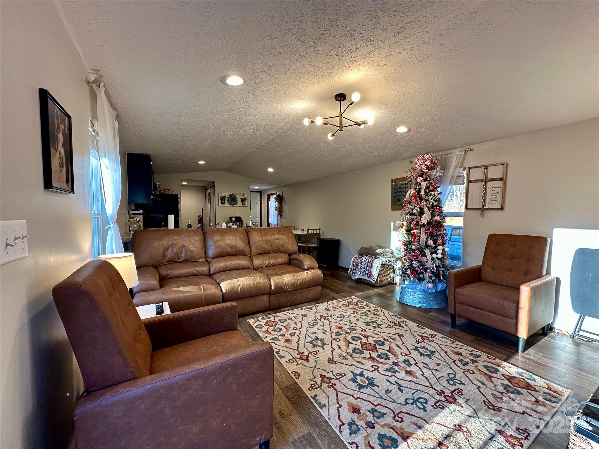 6264 Jenkins Road Morganton, NC 28655 - Photo 13 of 32 a living room with furniture a couch and a lamp