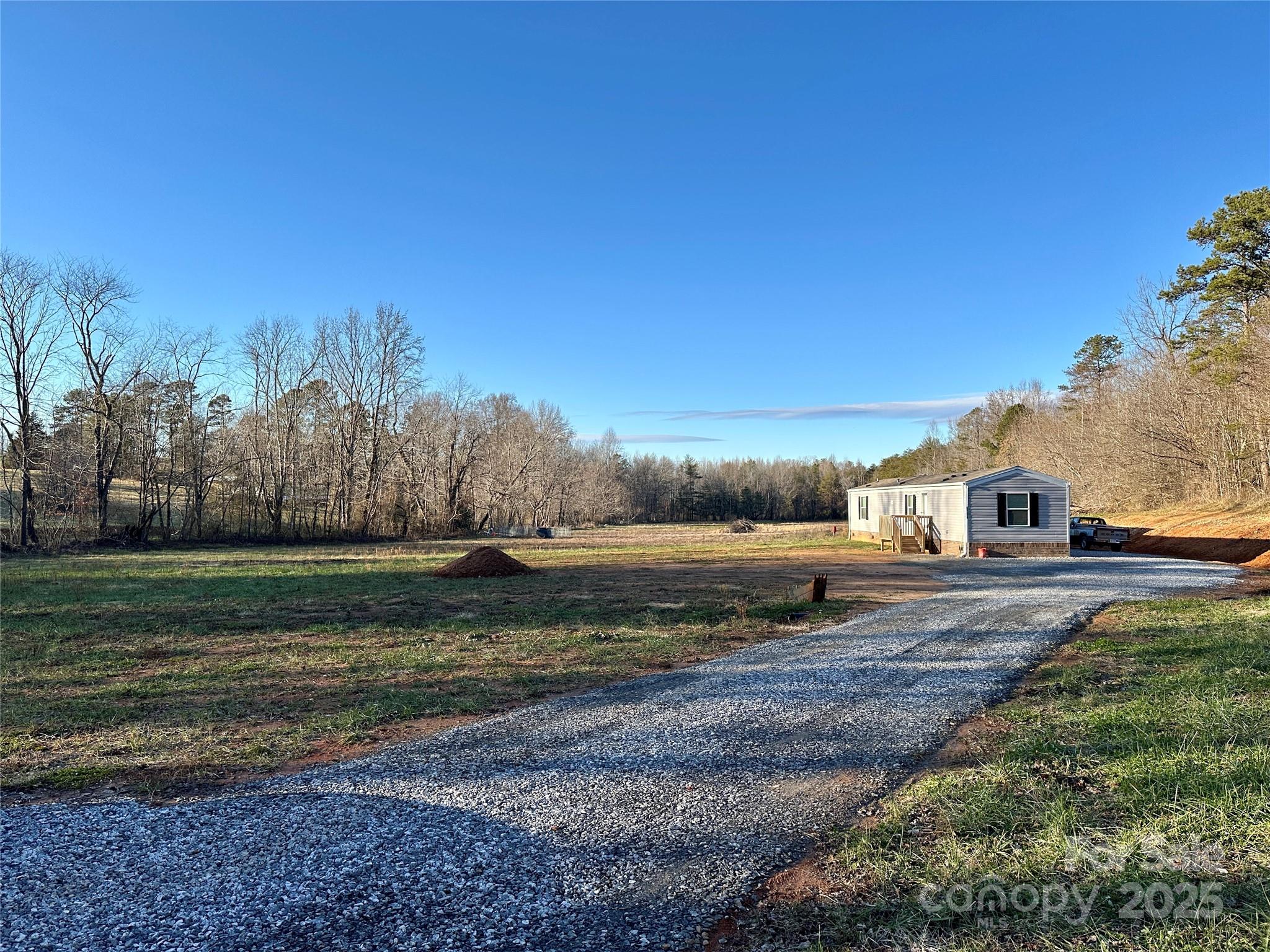6264 Jenkins Road Morganton, NC 28655 - Photo 3 of 32 a view of a yard with a house