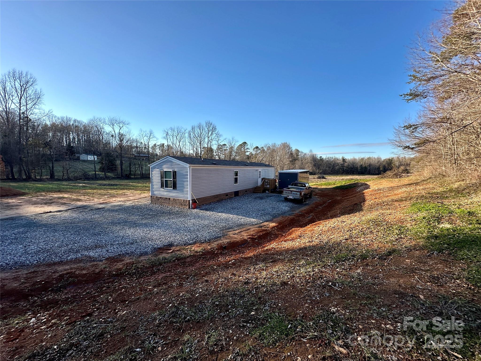 6264 Jenkins Road Morganton, NC 28655 - Photo 7 of 32 a view of a yard with an outdoor space
