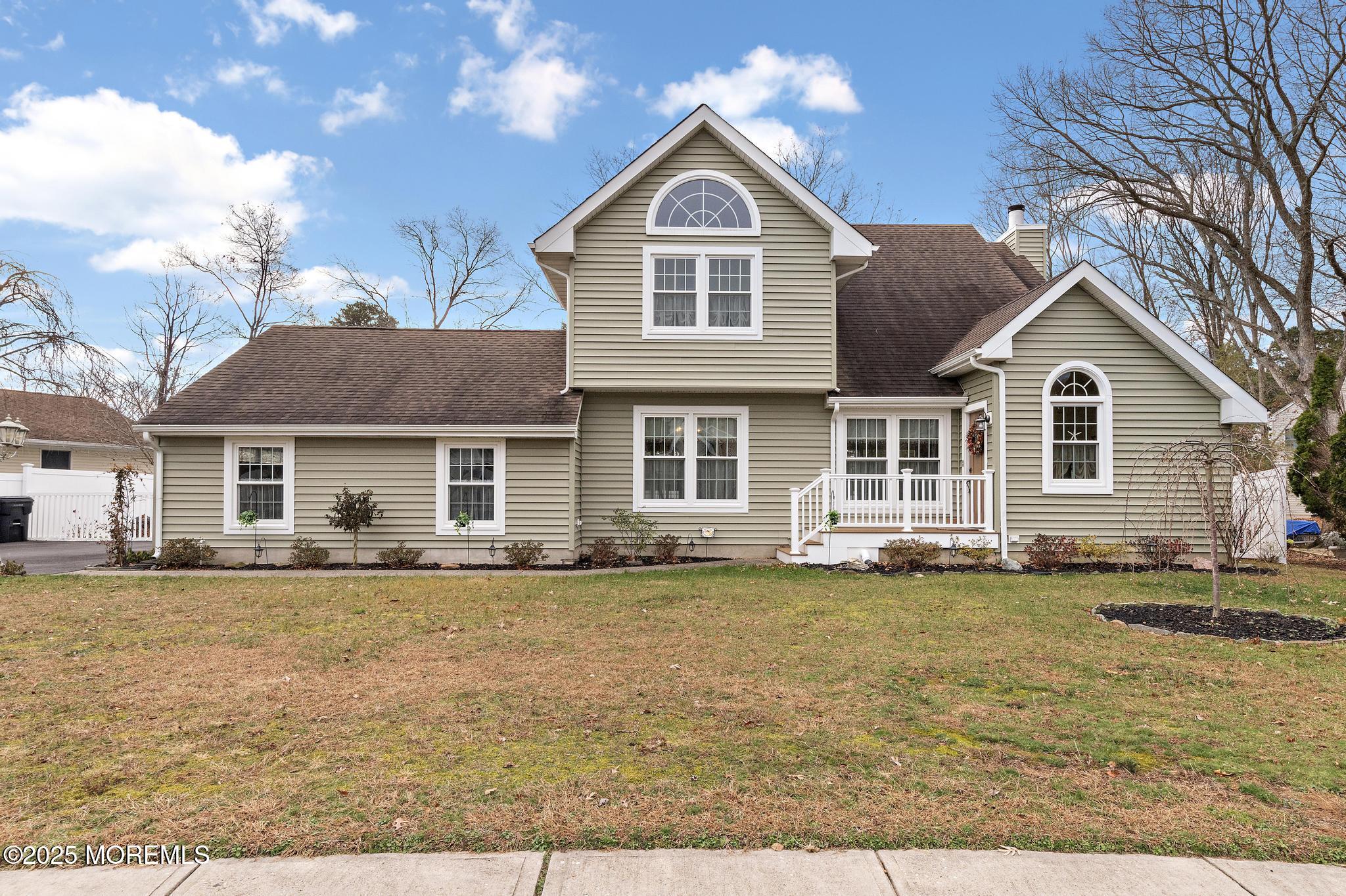 a view of a yard in front of a house with a yard