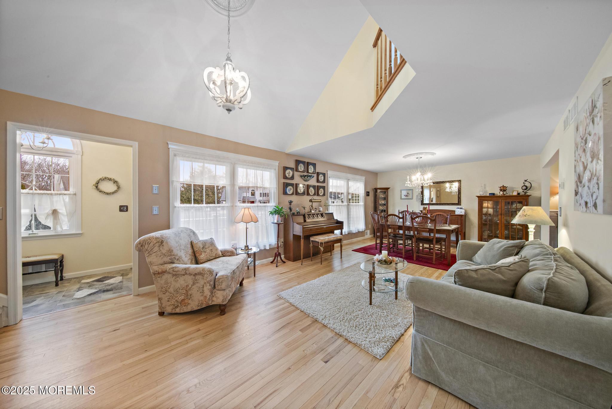 69 Chestnut Court Brick, NJ 08723 - Photo 3 of 23 a living room with furniture and a large window