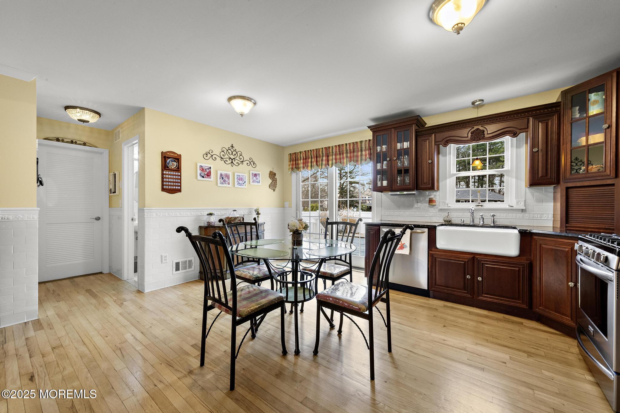 69 Chestnut Court Brick, NJ 08723 - Photo 6 of 23 a view of a dining room with furniture and wooden floor
