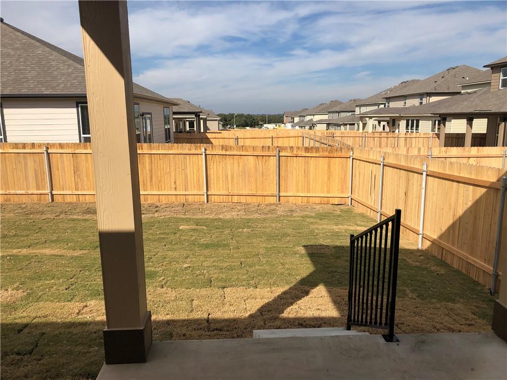625 Jud Allen Way Leander, TX 78641 - Photo 18 of 18 Fenced backyard featuring a residential view