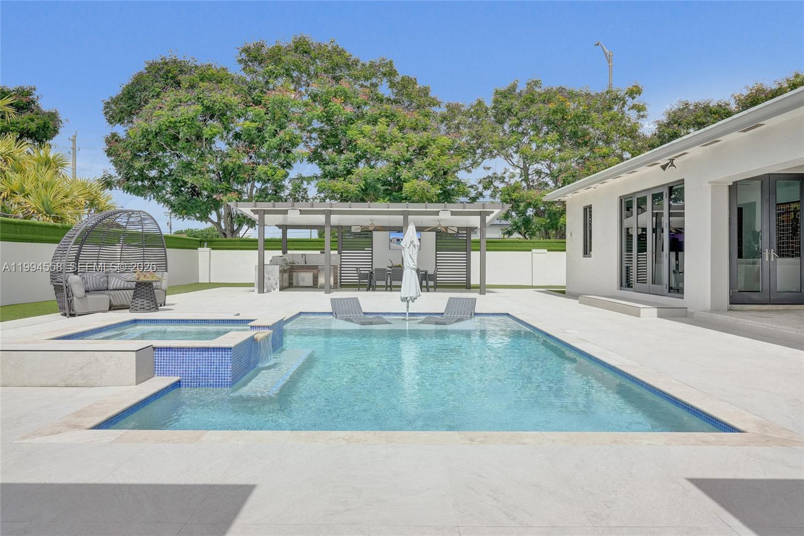 2600 Southwest 128th Court Miami, FL 33175 - Photo 19 of 50 swimming pool view with a outdoor seating