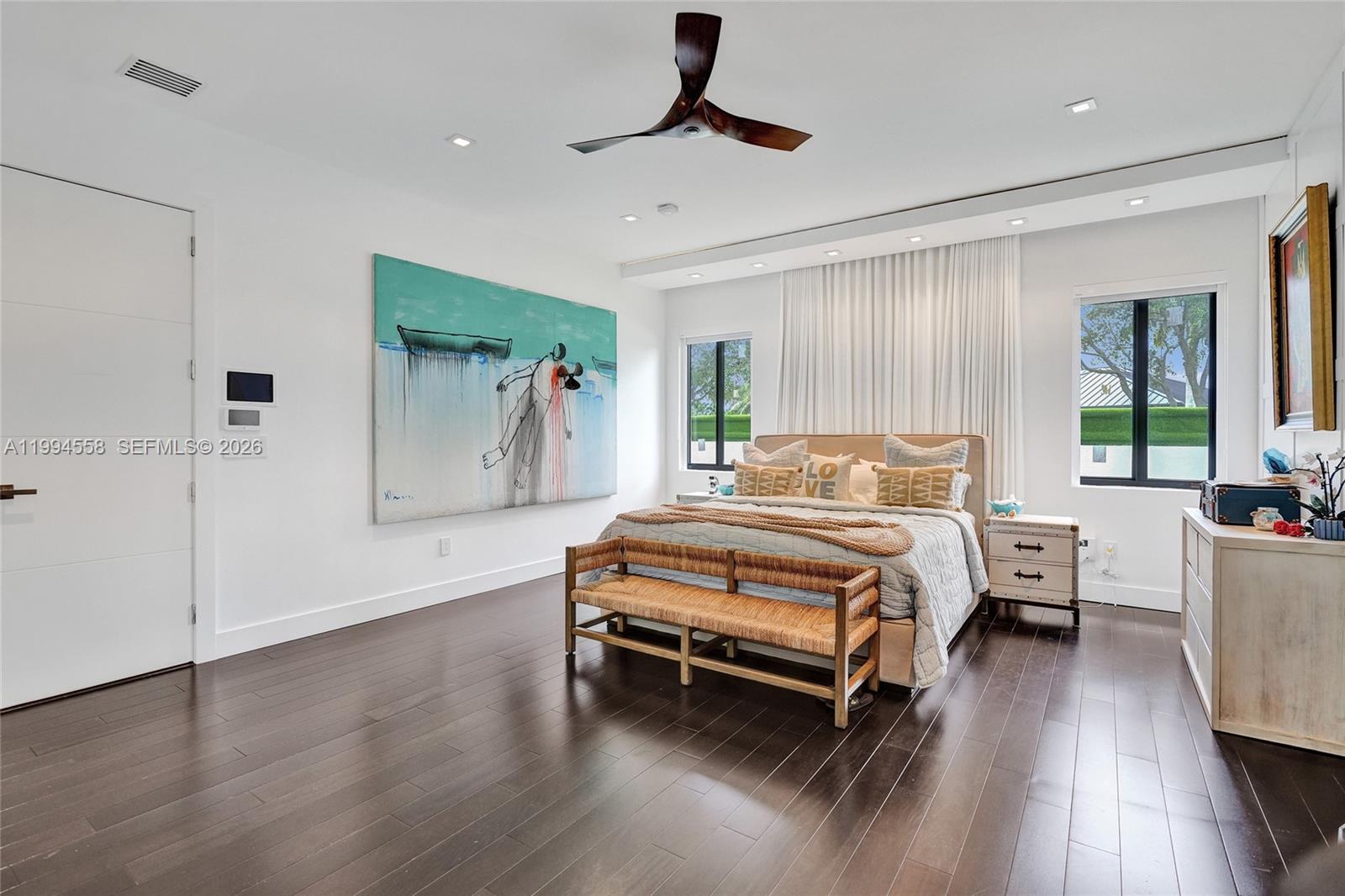 2600 Southwest 128th Court Miami, FL 33175 - Photo 33 of 50 a bedroom with a bed wooden floor and window