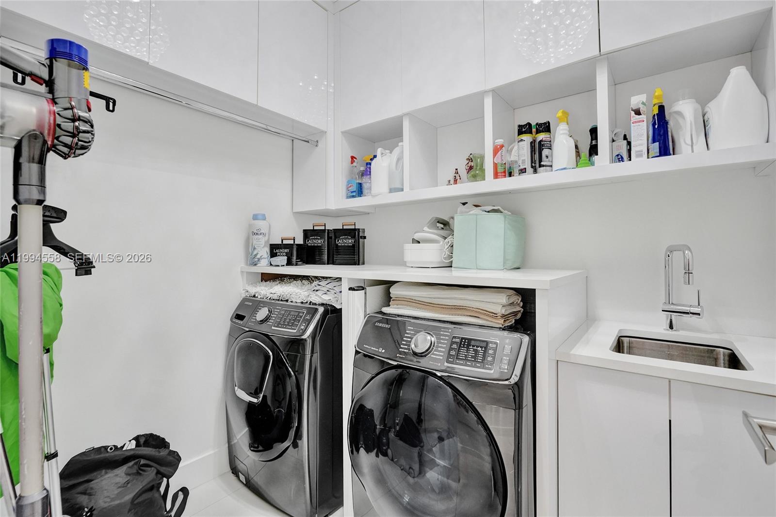 2600 Southwest 128th Court Miami, FL 33175 - Photo 45 of 50 a utility room with sink dryer and washer
