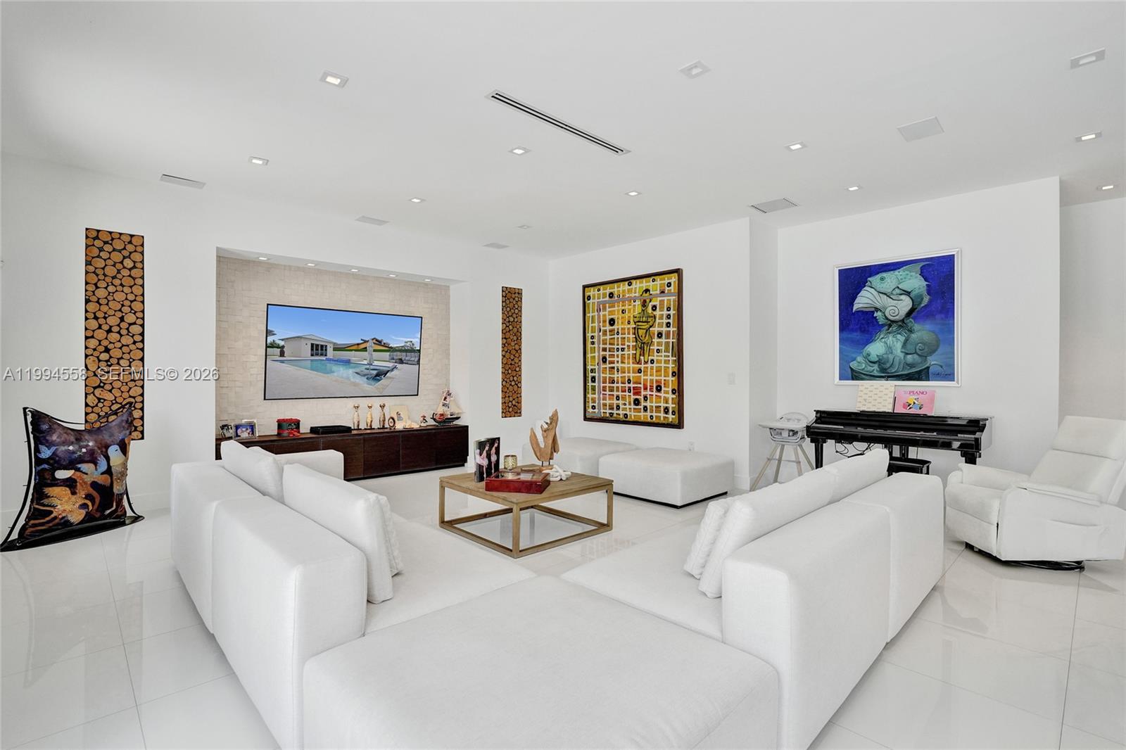 2600 Southwest 128th Court Miami, FL 33175 - Photo 10 of 50 a living room with furniture and a flat screen tv