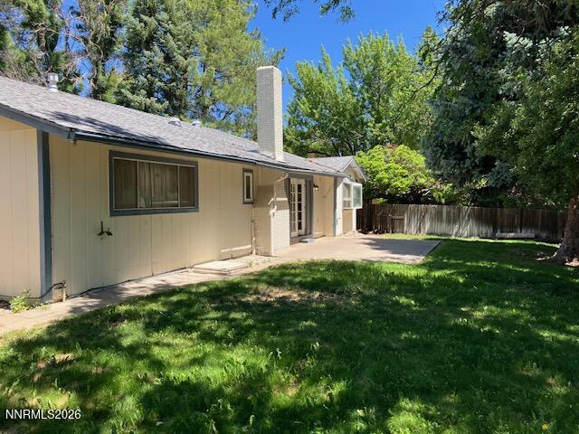 840 Meadow Springs Drive Reno, NV 89509 - Photo 19 of 23 a backyard of a house with plants and large tree